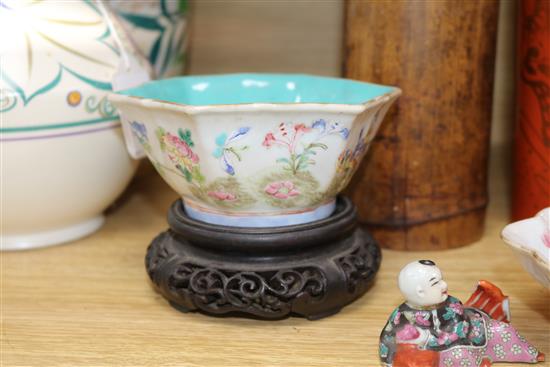 Two Chinese famille rose dishes, a figure of a boy, a porcelain brush pot and a bamboo brush pot tallest 28cm